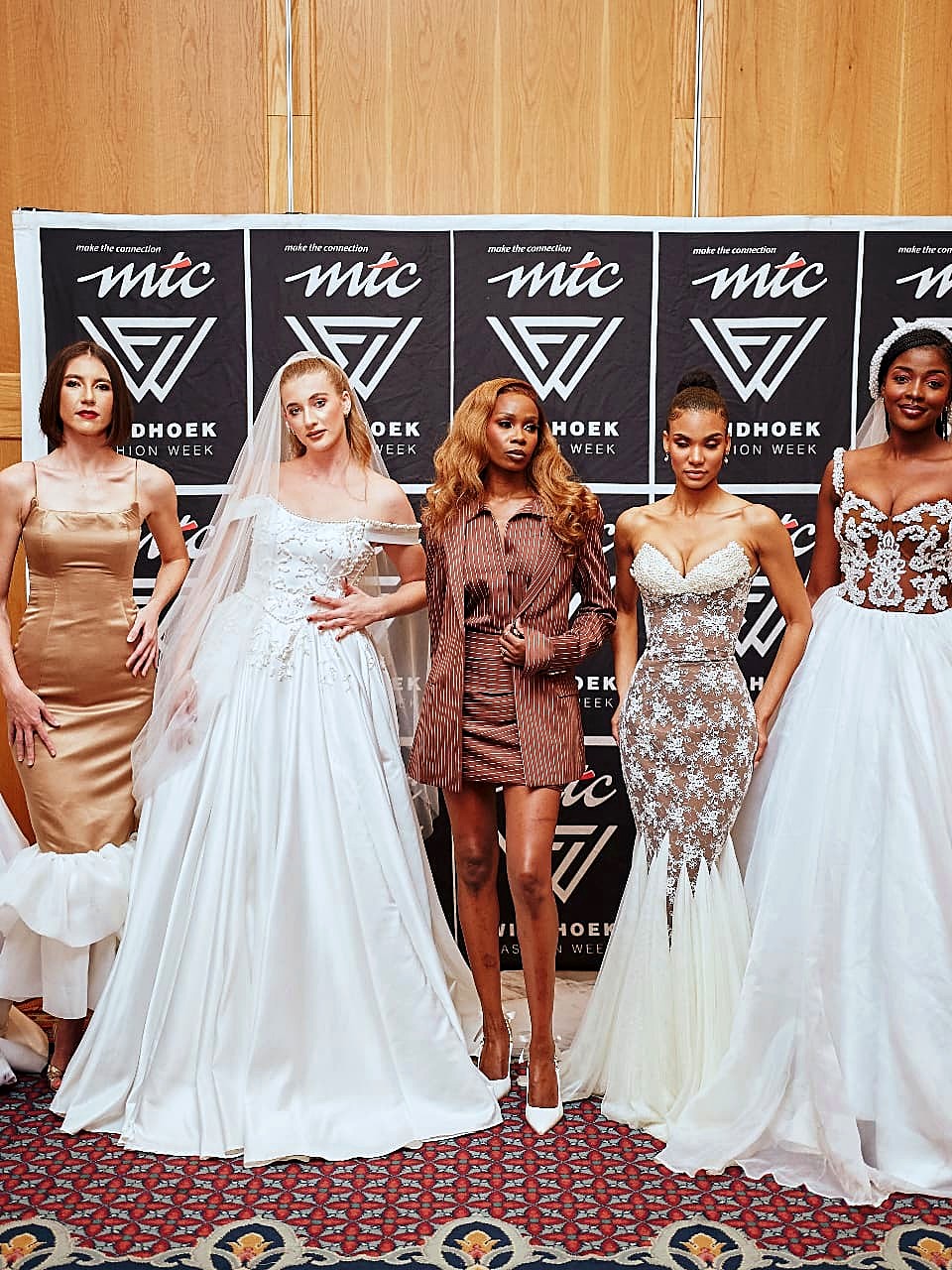 Foxxy Brides bridal collection presented on the MTC Windhoek Fashion Week runway, seven models in couture wedding gowns