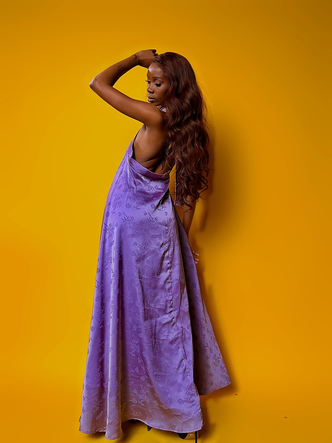 Open-back view of the lilac jacquard halter maxi dress